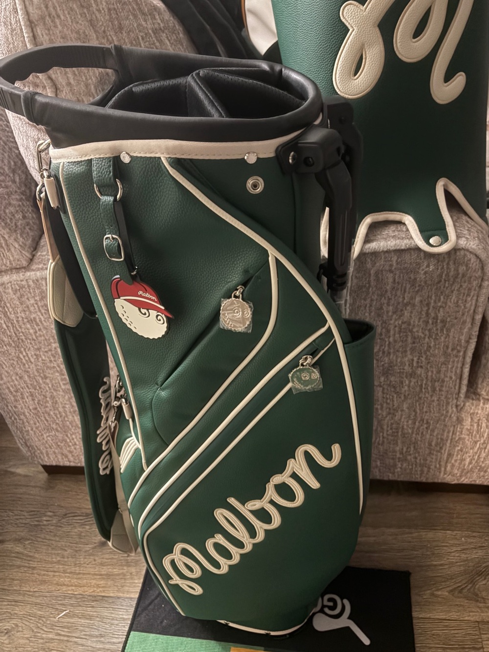 Malbon green golf bag.